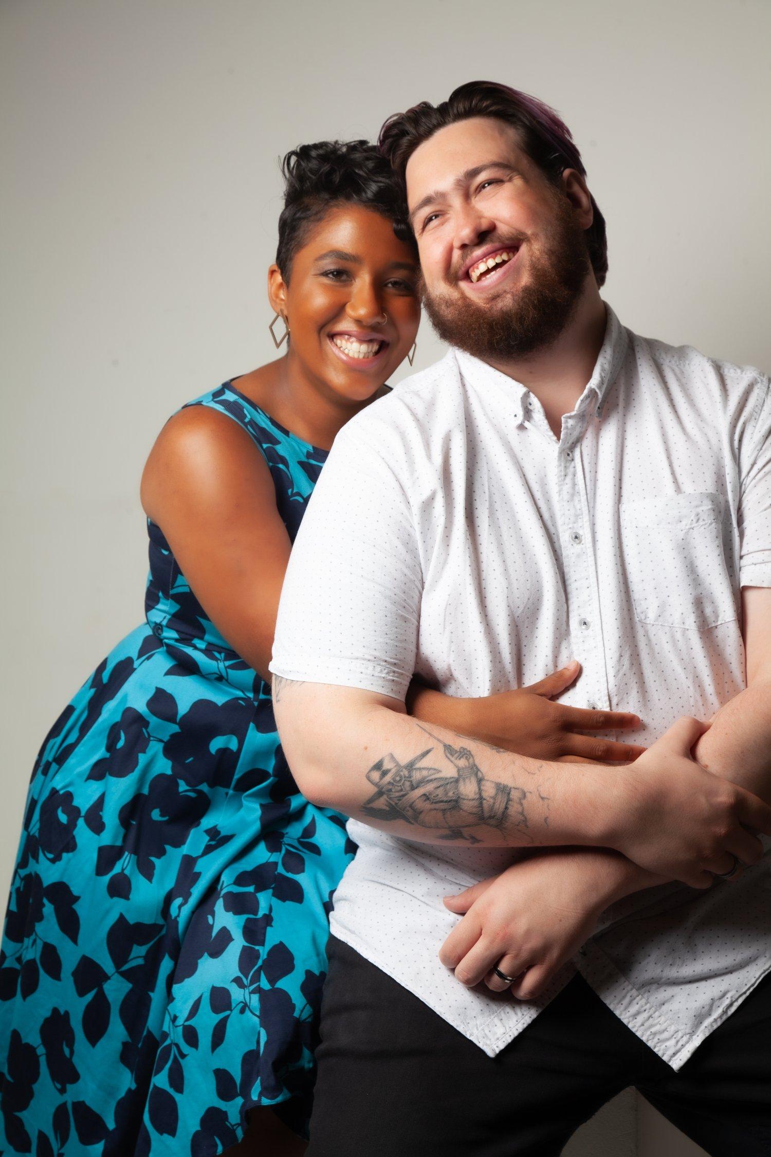 Rhyana and partner Matt laughing with each other.